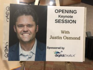 Justin Osmond REEA Sign